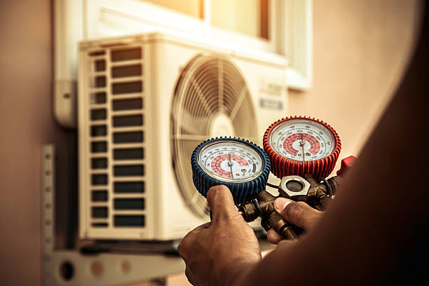 Professional Hvac technician working in Newton, NH